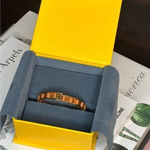 Fendi leather bracelet encased in gold plated hardware